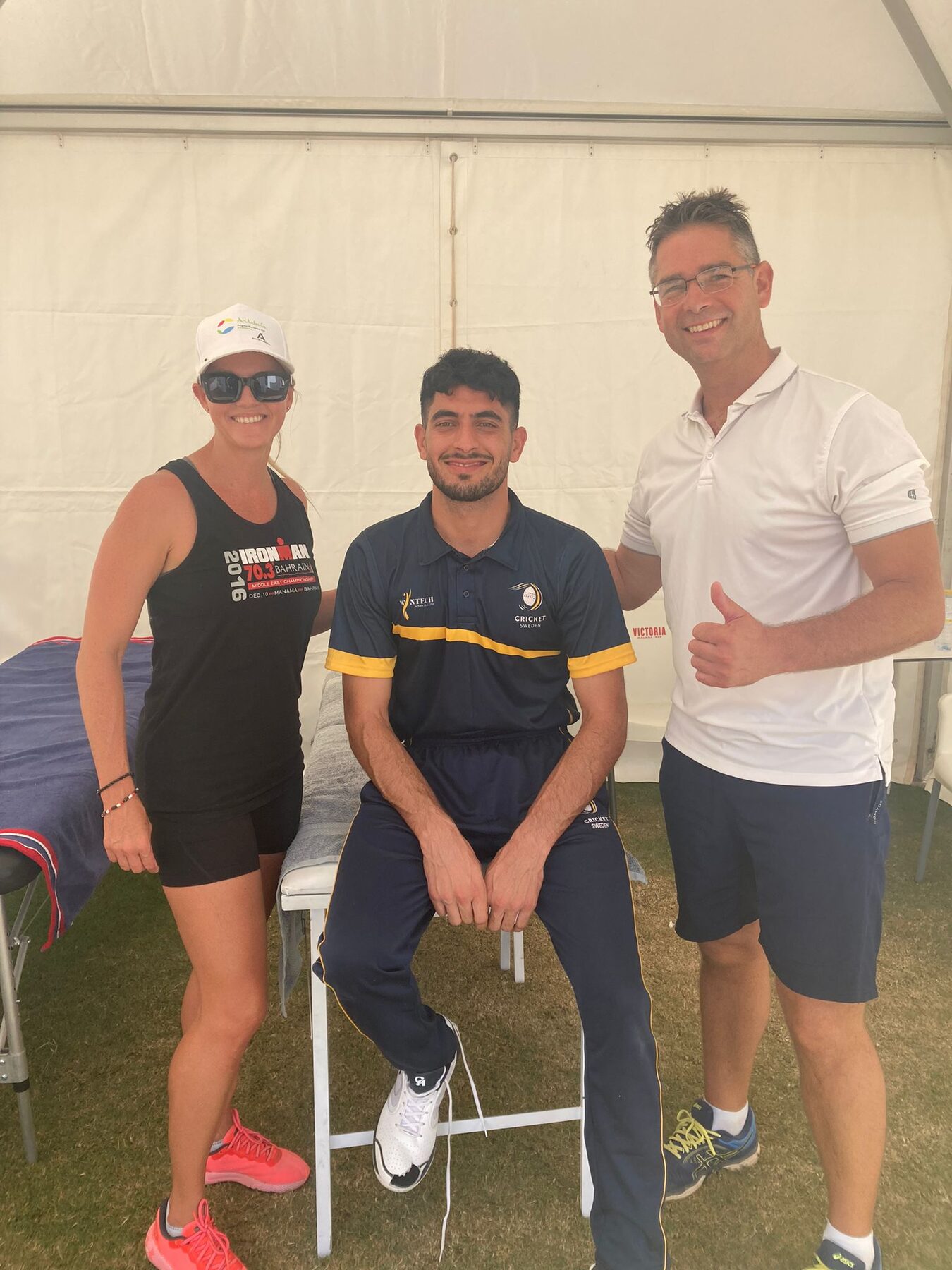 Richard with players at a cricket match